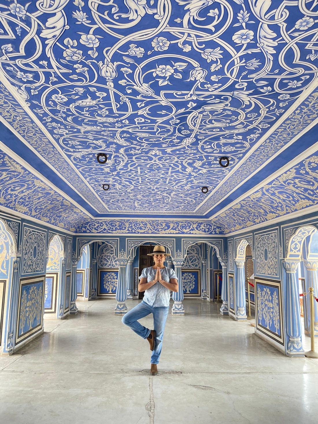 Sohavi designer Nicci Dhamu in tree yoga pose at City Palace Jaipur