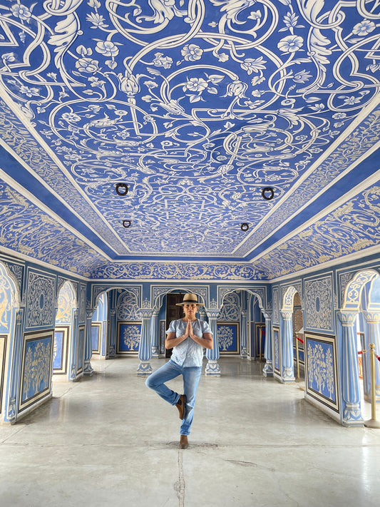 Sohavi designer Nicci Dhamu in tree yoga pose at City Palace Jaipur
