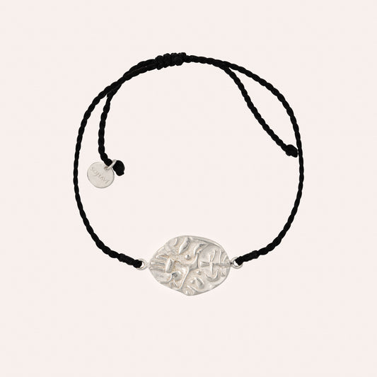 Sohavi Sterling silver antique coin charm bracelet in a black adjustable macrame cord. For guys & Gals.