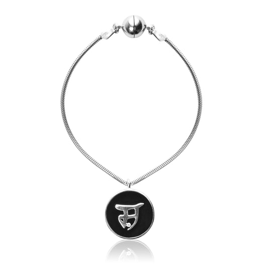 Bespoke Charm in sterling silver with black onyx face and Gurmukhi initial.