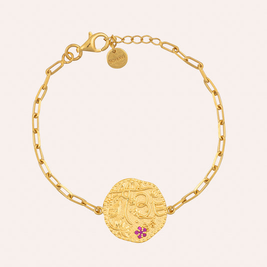 Finest quality sterling silver with 22K gold vermeil Gratitude Coin bracelet in a stylish adjustable link chain. Designed with symbols and floral accents reminiscent of the 15 century India also featuring a flower of 5 petal rubies . Reversible can be worn both ways.